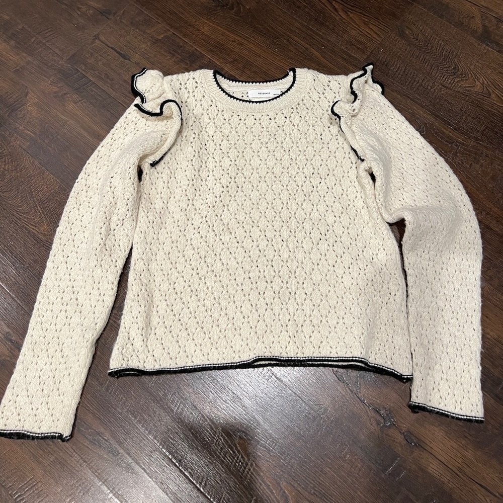 Elegant Cream Sweater with Ruffle Details by Reserved brand